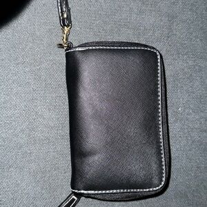 Small black leather Avon wallet.